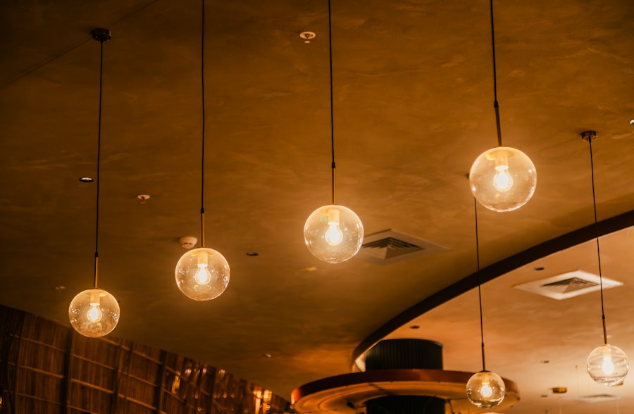 Real pendant light fittings with warm illuminated bulbs